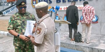 Navy hands over two suspected stowaways to Immigration Service, warns against illegal migration