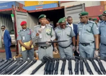 Customs intercepts 20-foot container carrying pump-action rifles, arrests 2 suspects
