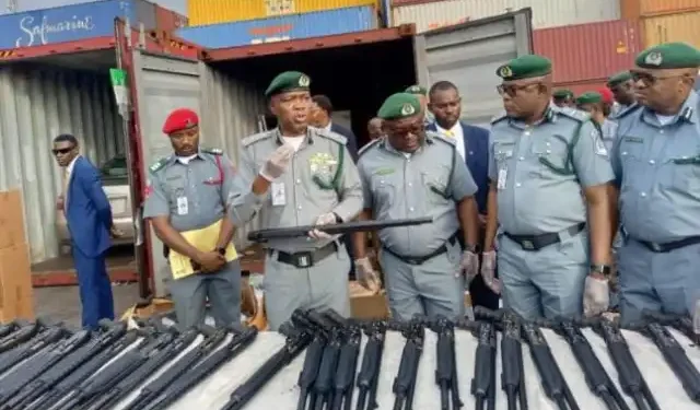 Customs intercepts 20-foot container carrying pump-action rifles, arrests 2 suspects
